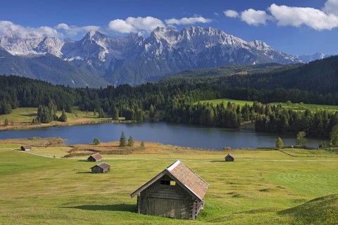 The Karwendel Mountain Range and huts along lake Gerold