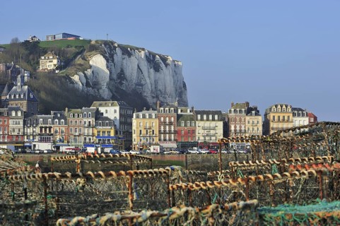Lobster traps and view over the town Le Treport