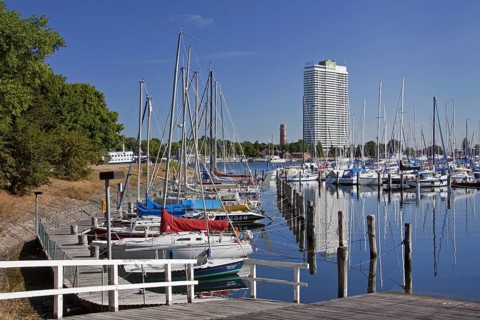 The Maritim Hotel and sailing boats in marina at Travemuende