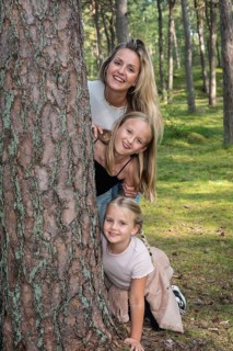 Blonde woman with two girls