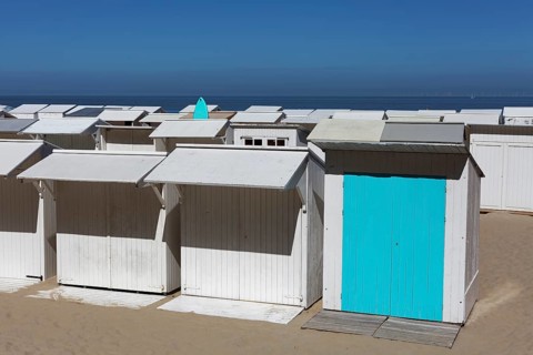 Uniform white beach huts