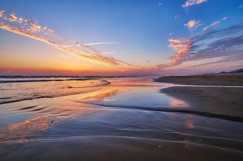 Atlantic ocean after sunset with surging waves at Fonte da Telha beach