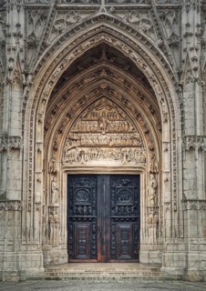 Saint Maclou Church entrance door