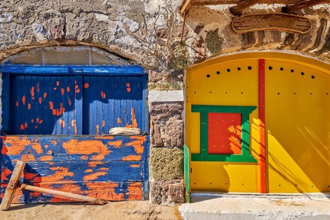 Colorful blue and yellow boat garage doors