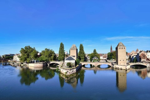 Historical tower of 'Ponts Couvert' bridge as part of defensive work erected in the 13th century on the River Ill in 'Petite France' quarter of Strasbourg city in France