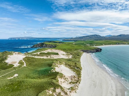 Aerial view of Faraid Head Peninsula and Balnakeil Beach with dunes and sandy beach