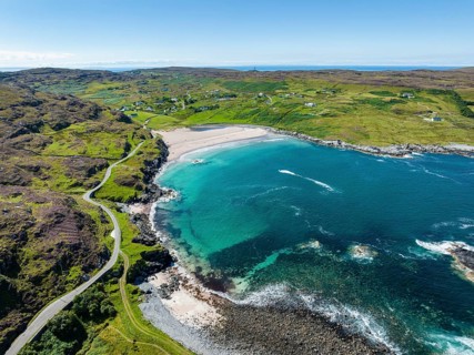 Aerial view of Clashnessie Bay and the single track road and scenic route B869