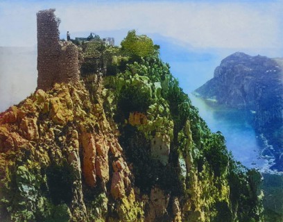 View of the ruins of Castello Barbarossa on Capri with a man and a woman on top