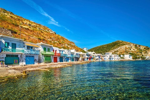 Colorful village of Klima with Greek whitewashed houses on sunny day