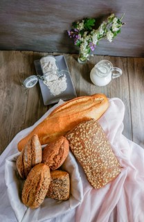 Loaves and loaves of rustic artisan bread made with different types of seeds and flours