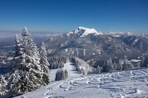 Winter landscape with ski tracks in deep snow