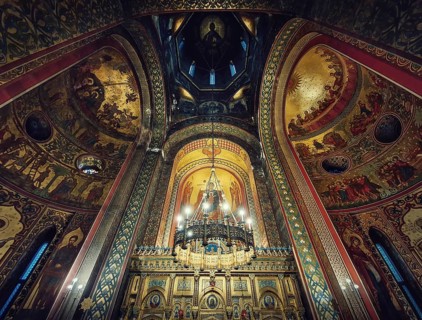 Interior architectural details of the Curtea de Arges monastery. The tall hall with painted icons