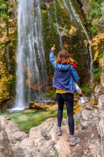 Mother with her son Grunas waterfall in Theth national park