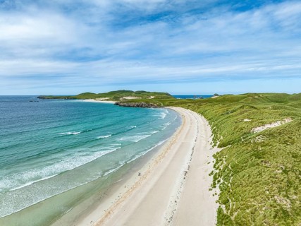Aerial view of Balnakeil Beach and the Faraid Head peninsula with sandy beach and dune landscape
