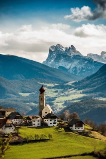 Snow-covered mountains and church