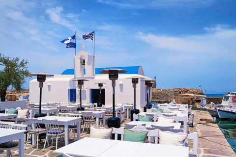 Seafood restaurant or cafe by waterfront of Naoussa bay
