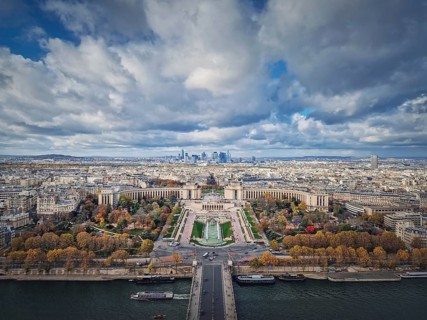 Aerial panoramic view from the Eiffel tower height to the Paris cityscape
