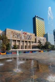 Water jets next to the National Historical Museum in Skanderbeg Square in Tirana. Albania