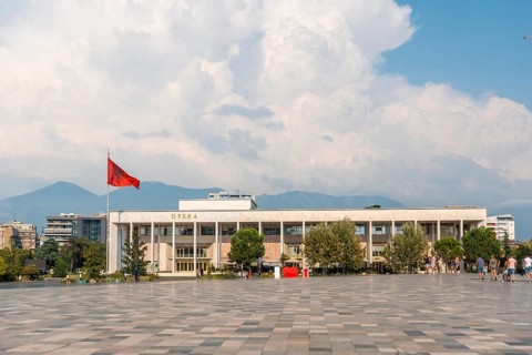 The entrance to the Palace of Culture or Opera on Skanderbeg Square in Tirana. Albania