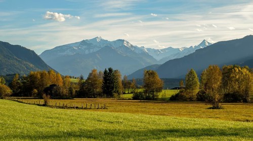 Moorland landscape in autumn near Saalfelden with Hoher Tenn and Kitzsteinhorn in the Hohe Tauern. Pinzgau