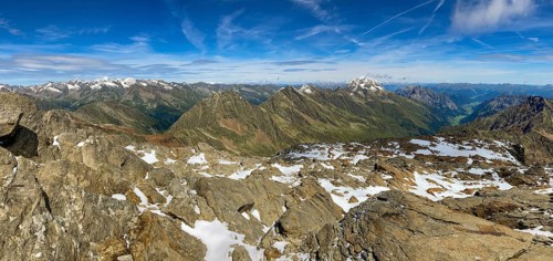 Panorama view from the summit of the Schneespitze to the Stubai Alps