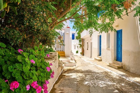 Cosy traditional summer streets and beautiful walkways of Greek town