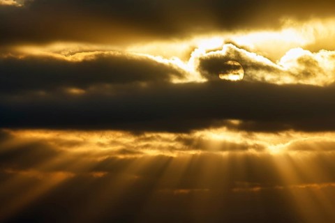 Sunbeams shining through clouds