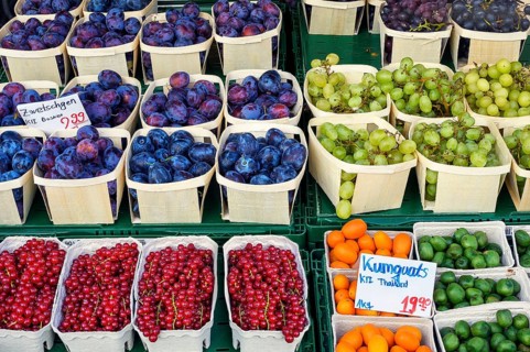 Market stall with plums