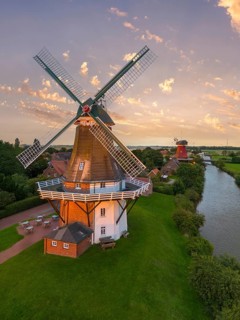 Aerial view of the twin mills at the Old Greetsiel Low Seal