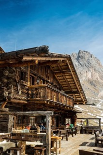 Snow-covered mountains and ski hut