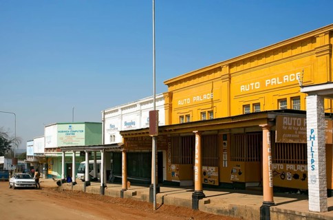 Colonial buildings and old sand road