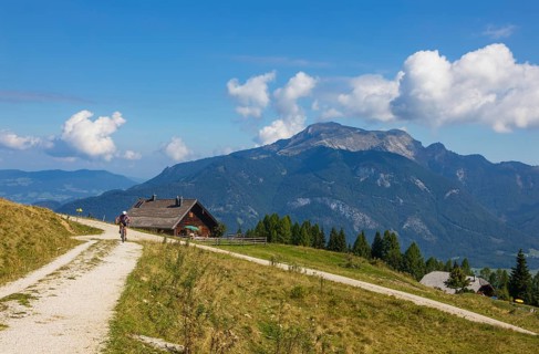 Alpine landscape with mountain bikers