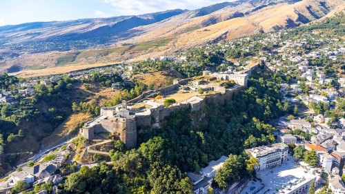 Aerial view of the old castle and fortress in the city of Gjirokaster or Gjirokastra