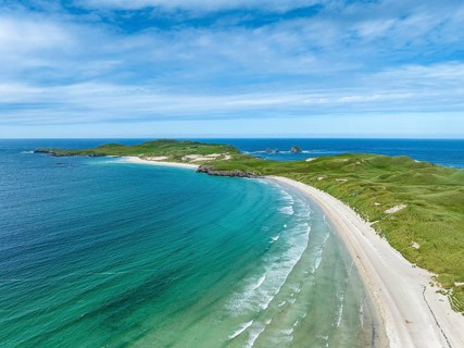 Aerial view of Balnakeil Beach and the Faraid Head peninsula with sandy beach and dune landscape