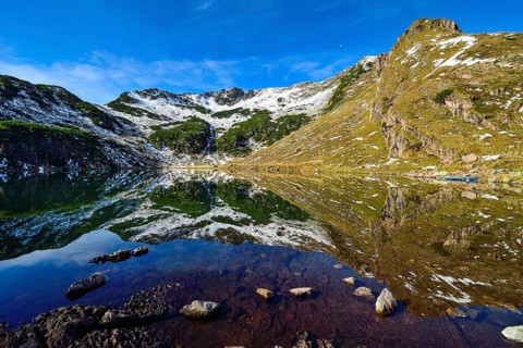 Reflection in the Wildsee lake at Wildseeloder in autumn early morning