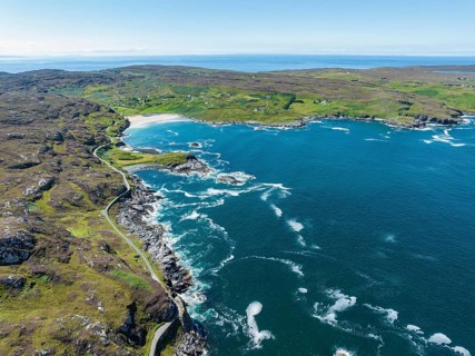 Aerial view of Clashnessie Bay and the single track road and scenic route B869