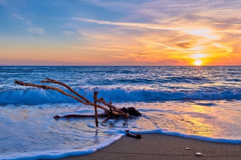 Sunset on sandy beach