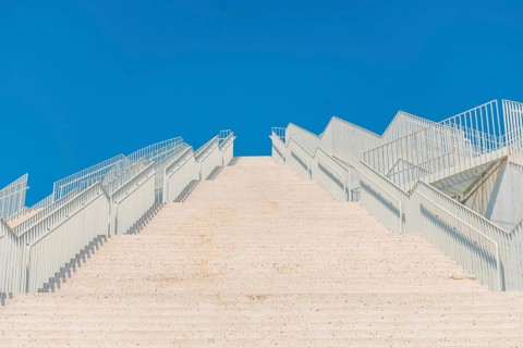 White stairs leading up to the Pyramid of Tirana in the center of Tirana. Albania