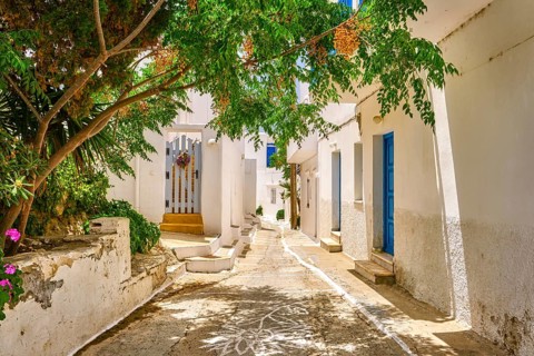 Cosy traditional summer streets and beautiful walkways of Greek town