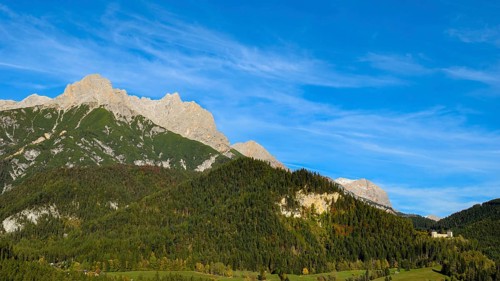 Lichtenberg Castle near Saalfelden in autumn with Persailhorn and Breithorn