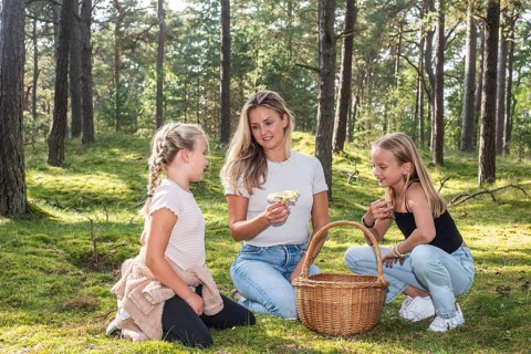 Blonde woman with two girls