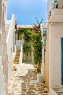 Traditional Greek island town square with whitewashed walls