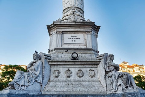 Figures at the base of the statue of Pedro IV