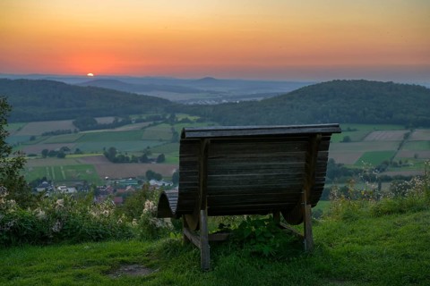 Wooden lounger in the sunset