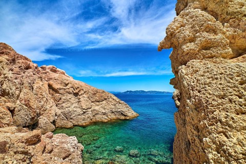 Majestic rocks of Greek island landscape. Sunny summer day