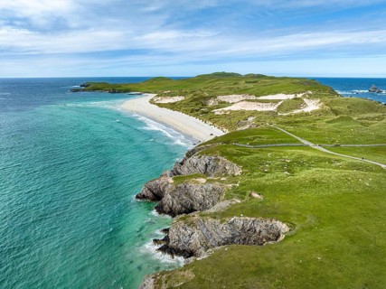 Aerial view of the dune landscape on the Faraid Head peninsula with sandy beach