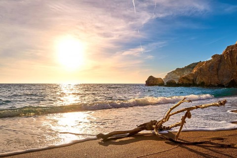 Sunset on sandy beach