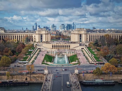 Closeup aerial view of the Trocadero area with La Defense metropolitan district seen at the horizon in Paris