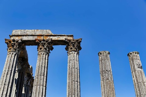 Columns against a blue sky