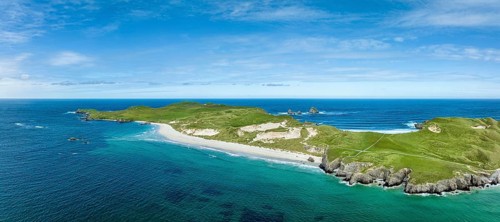 Aerial panorama of Faraid Head peninsula with dunes and sandy beach